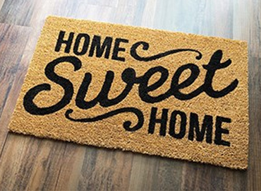 Home sweet home welcome mat.
