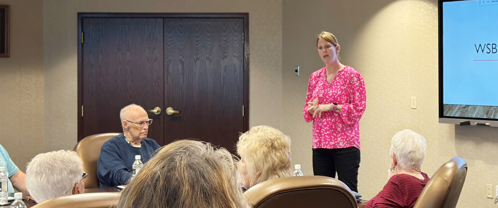 Janessa Sparacino gives a seminar on how to avoid fraud and scams.