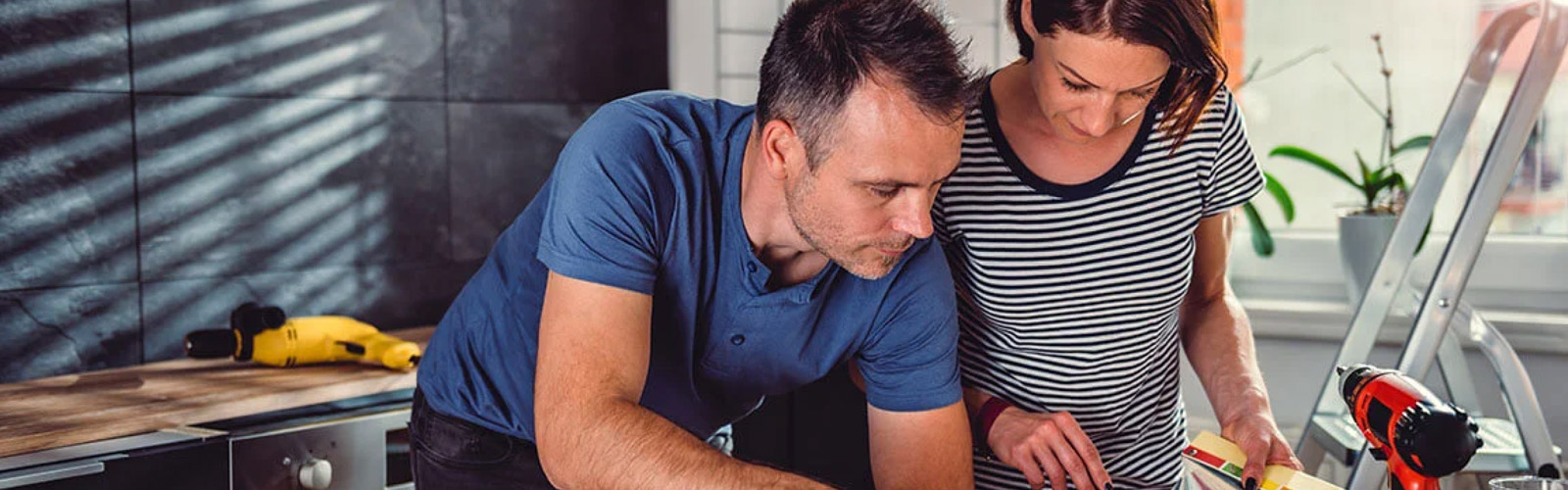 Couple working on home improvement project.