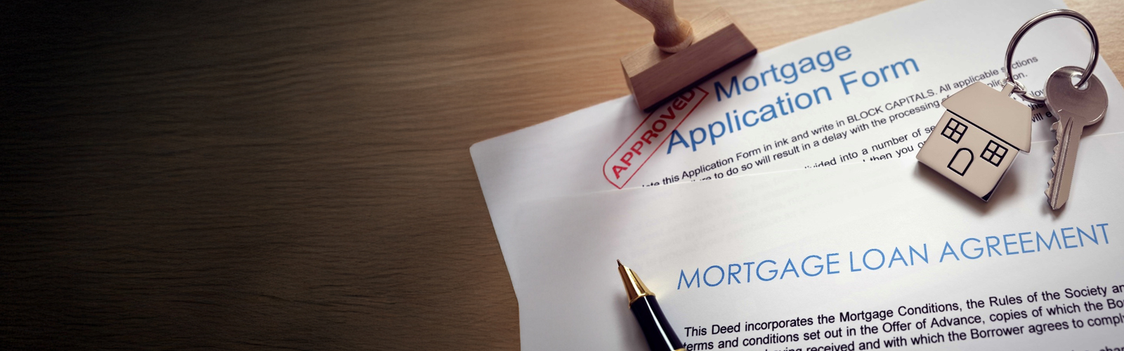 Photo of a mortgage application stamped approved.