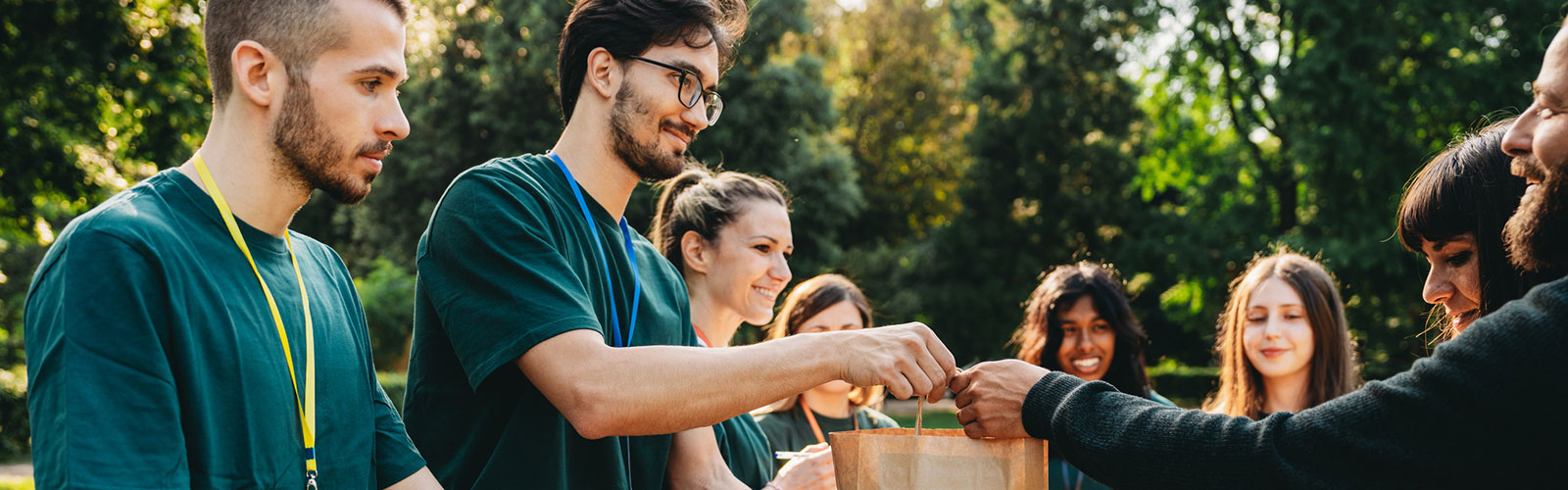 A group of young people doing community volunteer work.